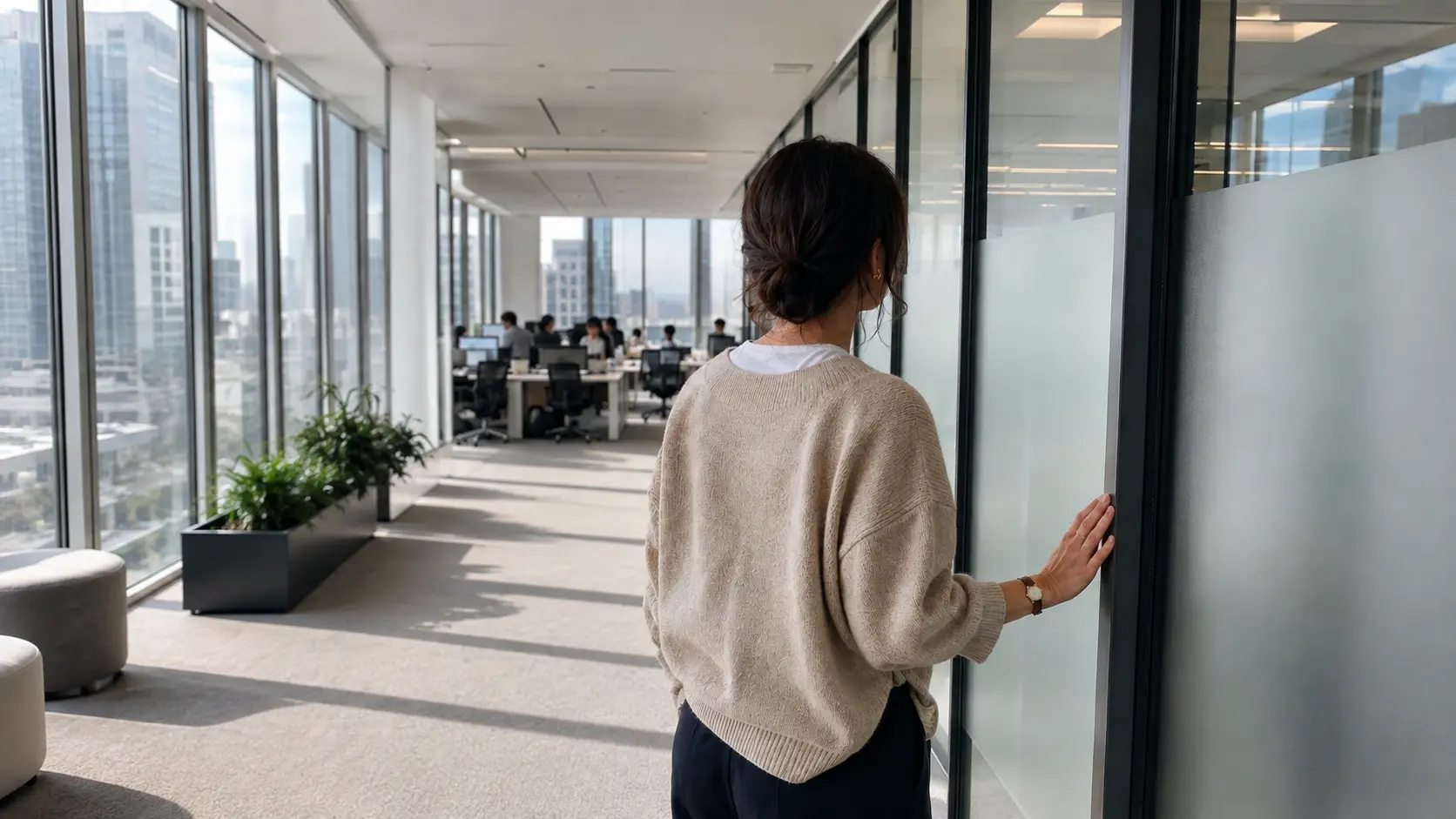 Foreign employee pausing outside a Seoul meeting room reviewing korean phrases workplace office situations require